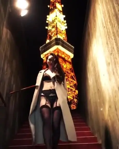 Beautiful exhibitionist girl wears sexy lingerie and goes down the stairs in front of Tokyo Tower!