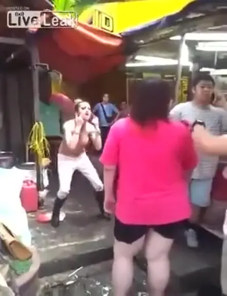 Stripping down in the street, showing off breasts, and yelling at the store clerk all recorded