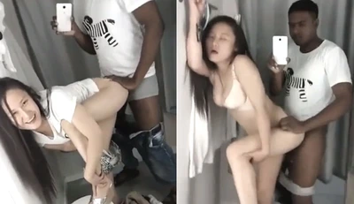 A big slut and a black man took a selfie of having sex in a shopping mall fitting room. From the sound of it, it sounds like business is good outside. There should be a lot of people queuing outside.