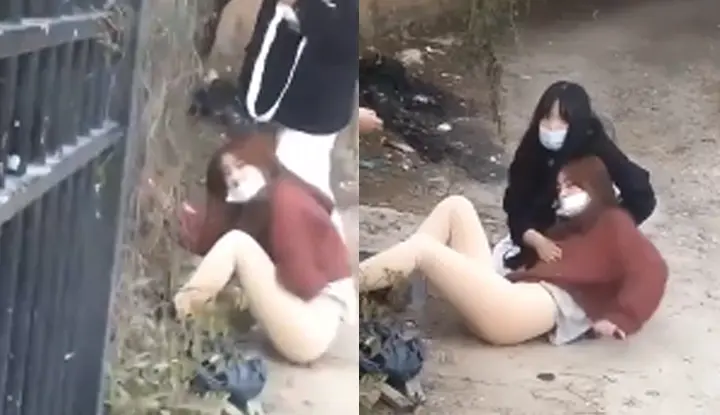 The Internet went viral ~ A student girl skipped class and climbed over the wall to celebrate Christmas! Her long skirt was accidentally pulled off, revealing her round buttocks! A passerby accidentally recorded the whole process!