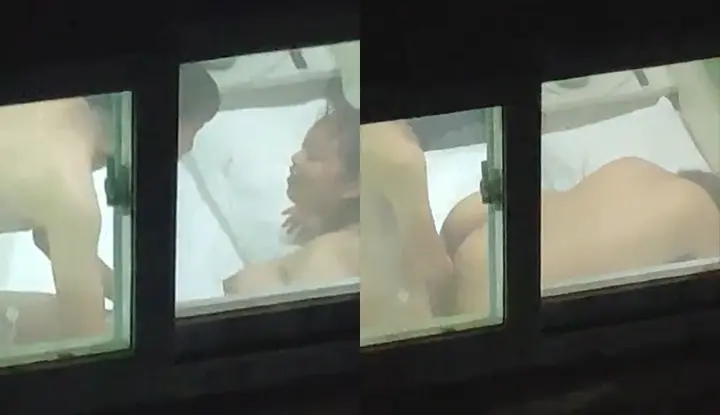 Freshman students having sex in the dormitory were filmed by the building opposite~