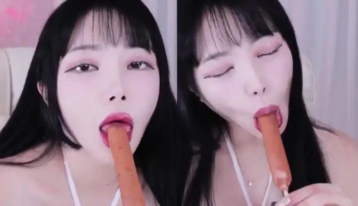 [South Korea] Sexy anchor with big breasts eats hot dog. Do you want to be eaten by the anchor too?